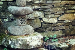 Amagansett, NY -Japanese style lantern & lichen covered stacked wall and boulders