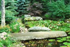 Springs-East Hampton, NY - 15’ long natural blue stone extending into man-made pond