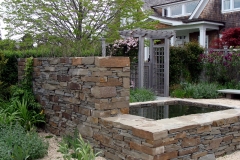 Sagaponack, NY - Stone wall with pond