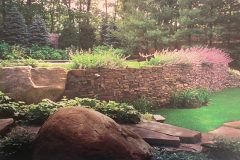 East Hampton, NY - Stacked rock wall with indigenous boulders