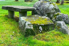 Springs-East Hampton, NY - Moss & lichen encrusted granite boulders with a naturally shaped bluestone bench