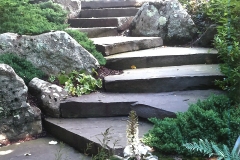Amagansett, NY - Blue stone steps with granite boulders